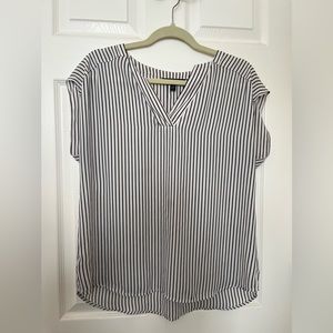 Banana Republic black and white stripe blouse. Short sleeve. Size petite medium.